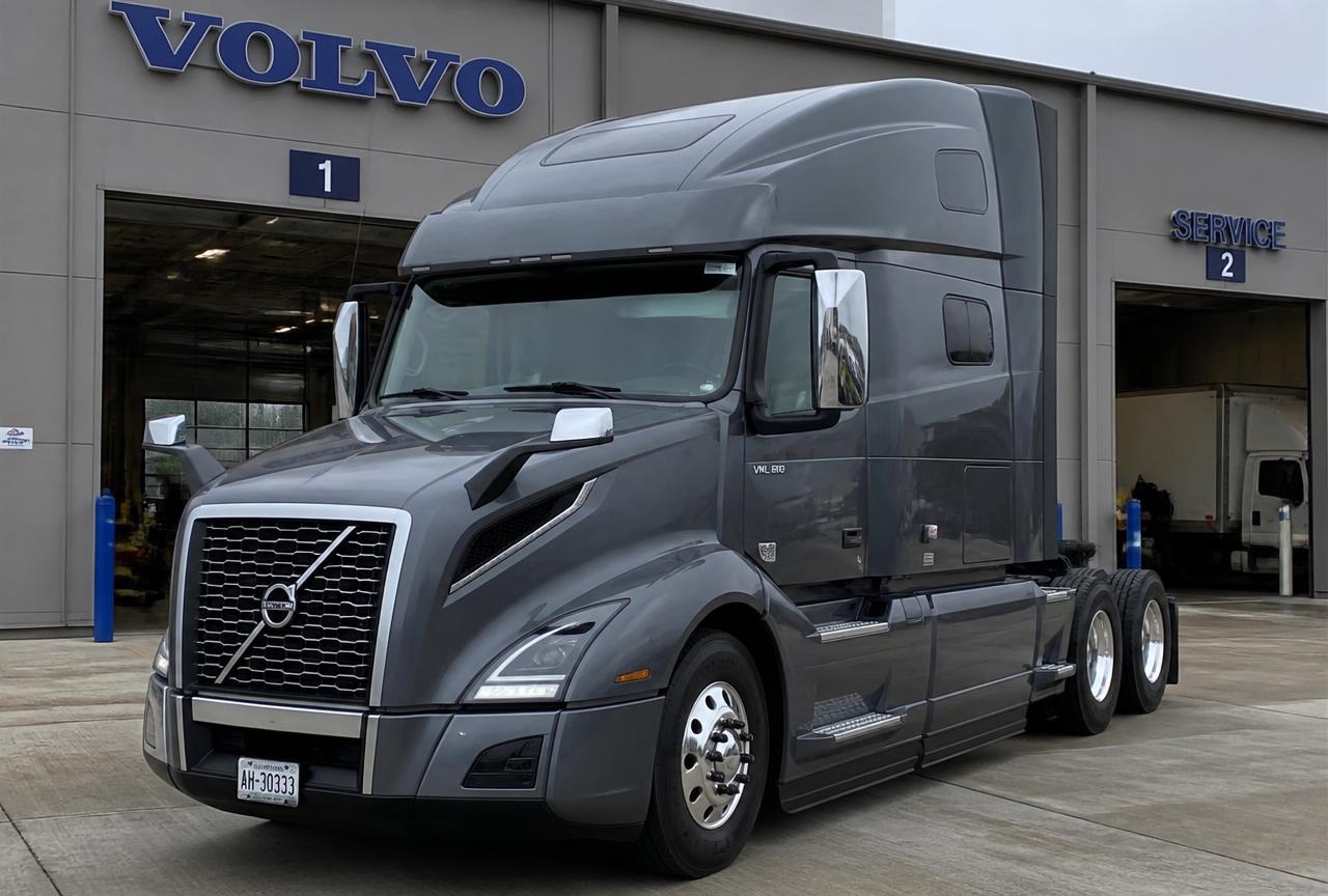 2026 Volvo VNL 860 in charcoal at a dealership service bay
