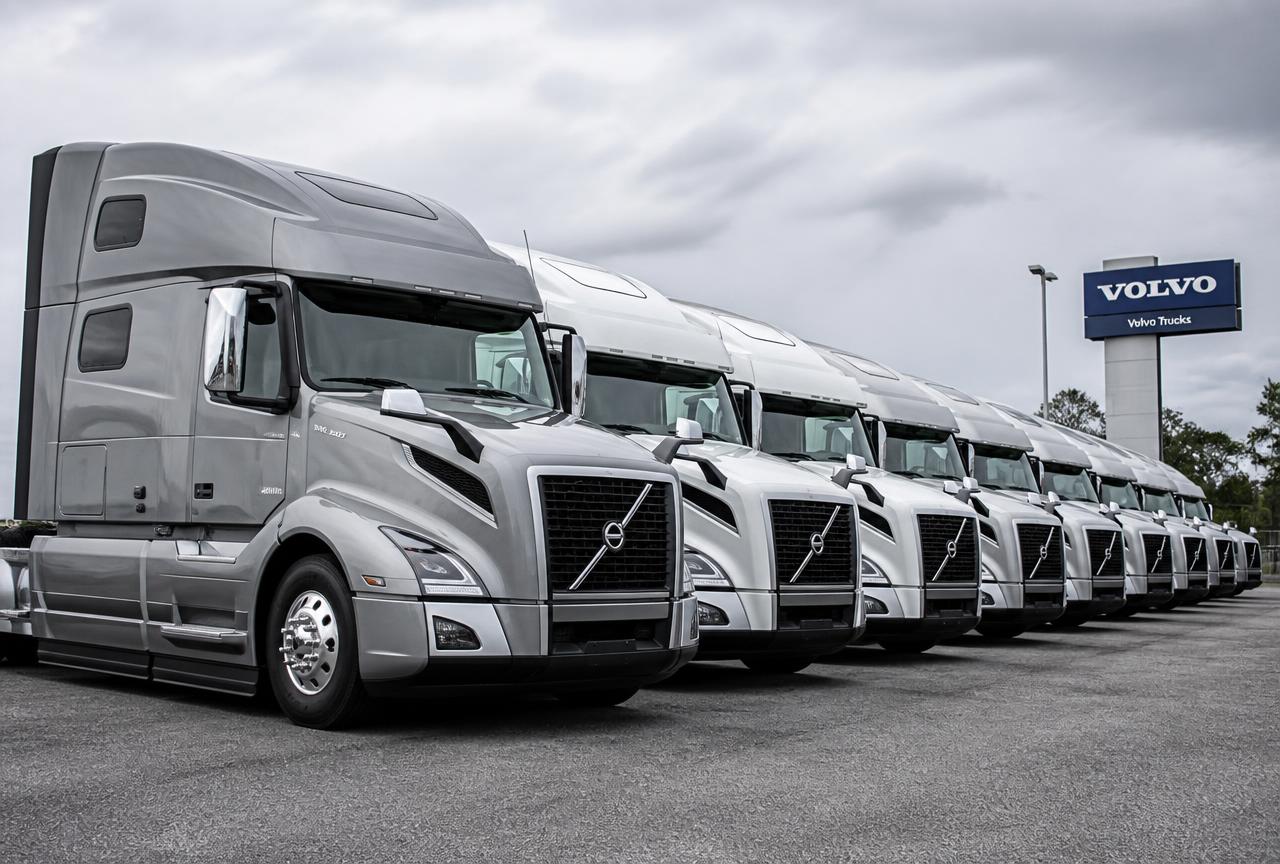 Row of 2026 Volvo VNL 860 tractors in a dealership lot